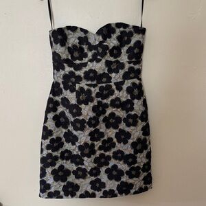 Elegant Strapless Dress with Black Floral Pattern